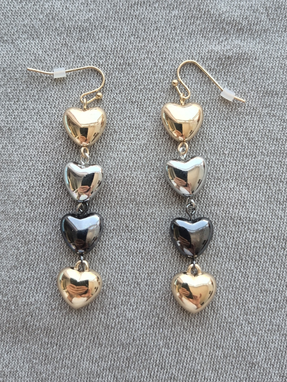 Triple Heart Drop Earrings in Gold, Silver, and Black